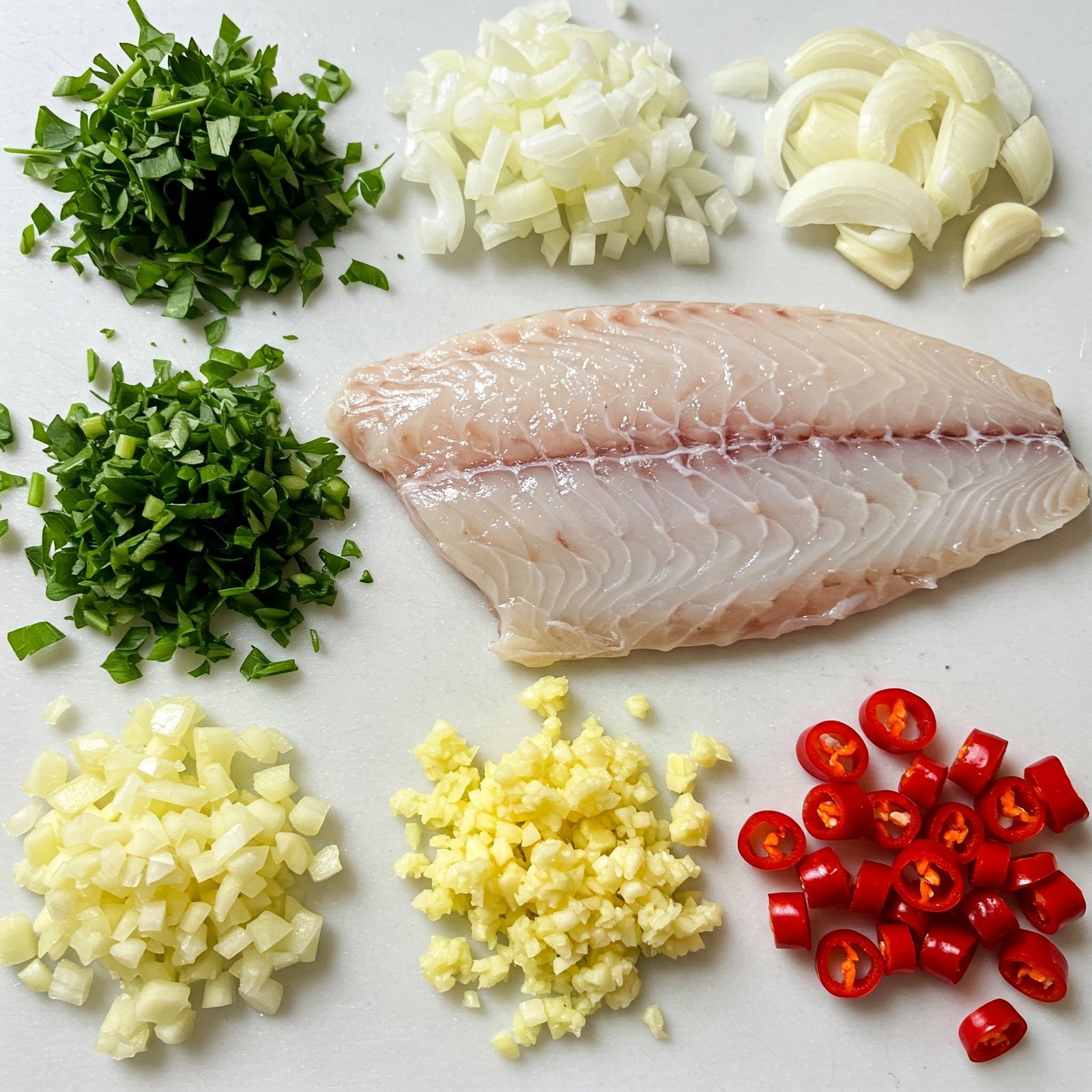 Mise en place, colas de rape en salsa verde